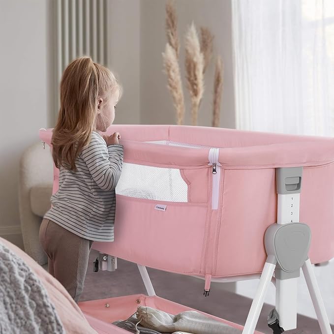 Cowiewie Bassinet Bedside Sleeper, Baby Bassinet with 7 Adjustable Height, Bedside Bassinets for Baby with Breathable Mesh Sides & Mattress, XL Storage, Easy Folding Crib (Pink and White)