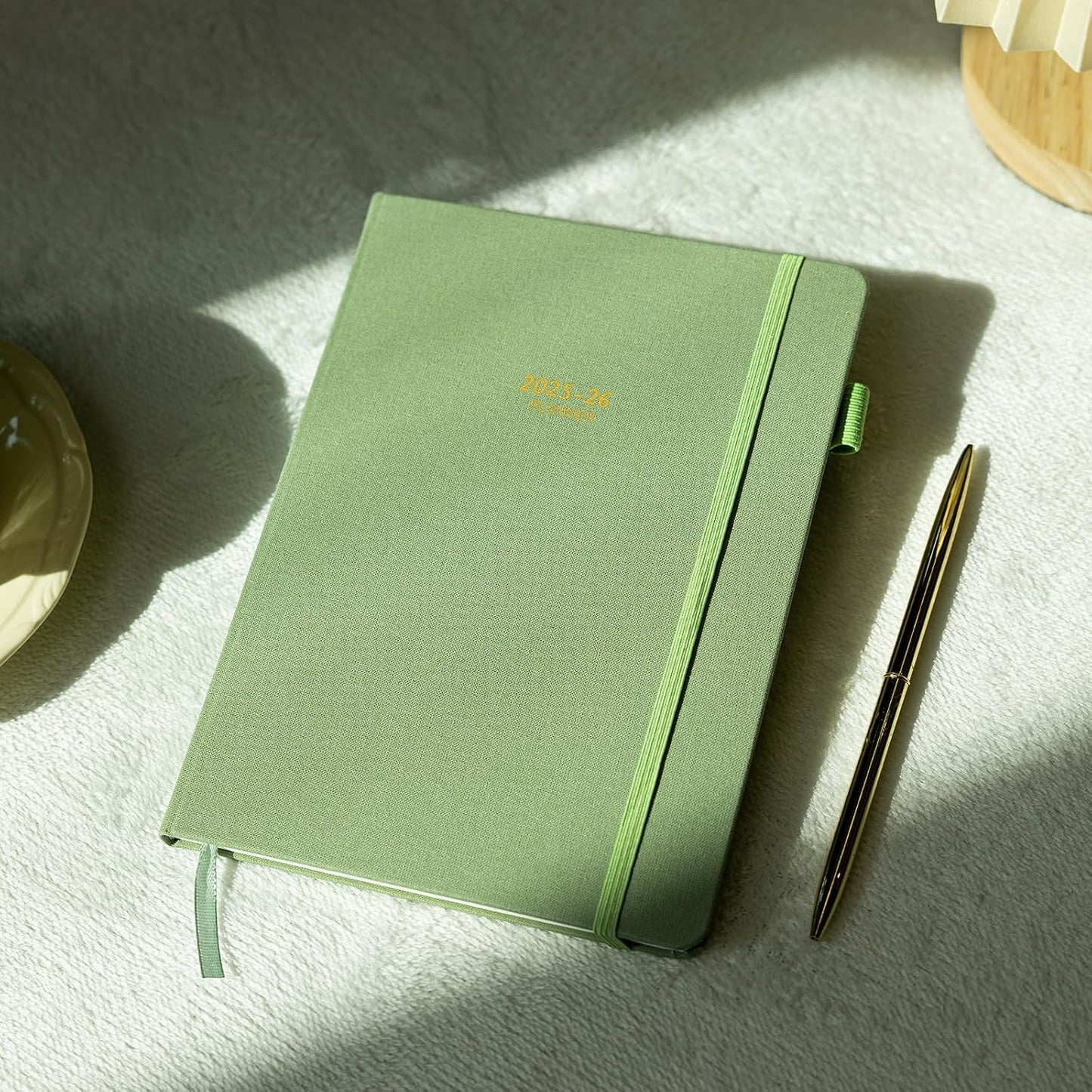 Getink Linen Cover 2025-2026 Planner Weekly & Monthly Daily Agenda Book,2025-2026 To Do List Notebook with Colorful Monthly Tabs, Inner Pocket, Elastic Closure (Green,7.3 * 10)