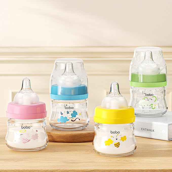 YOHKOH Glass Baby Bottles with Slow Flow Nipple, Newborn Anti-Colic Baby Bottles for 0+ Months, Wide Neck Feeding Bottle, Clear (Yellow, 2.7oz (Pack of 4))