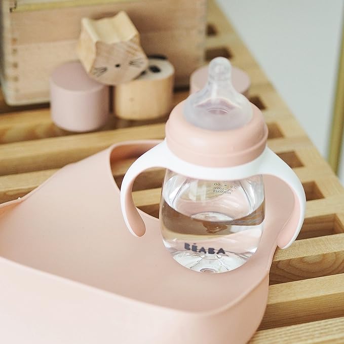 BEABA 2-in-1 Baby Bottle to Transition Sippy Cup, No Spill Sippy Cup, Includes Removable Handles, Silicone Baby Bottle Nipple and Soft Spout, 7 oz (Rose)