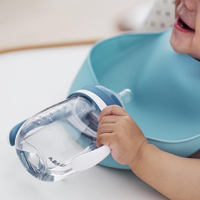 BEABA 2-in-1 Baby Bottle to Transition Sippy Cup, No Spill Sippy Cup, Includes Removable Handles, Silicone Baby Bottle Nipple and Soft Spout, 7 oz (Rain)
