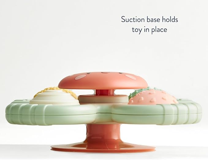 Itzy Ritzy Pop & Whirl – Fidget Spinner Travel & Bath Toy for Babies & Toddlers – Fidget w/Textured Silicone Popper to Develop Fine Motor Skills –Sticks to Highchairs, Tables, Tubs, More (Strawberry)