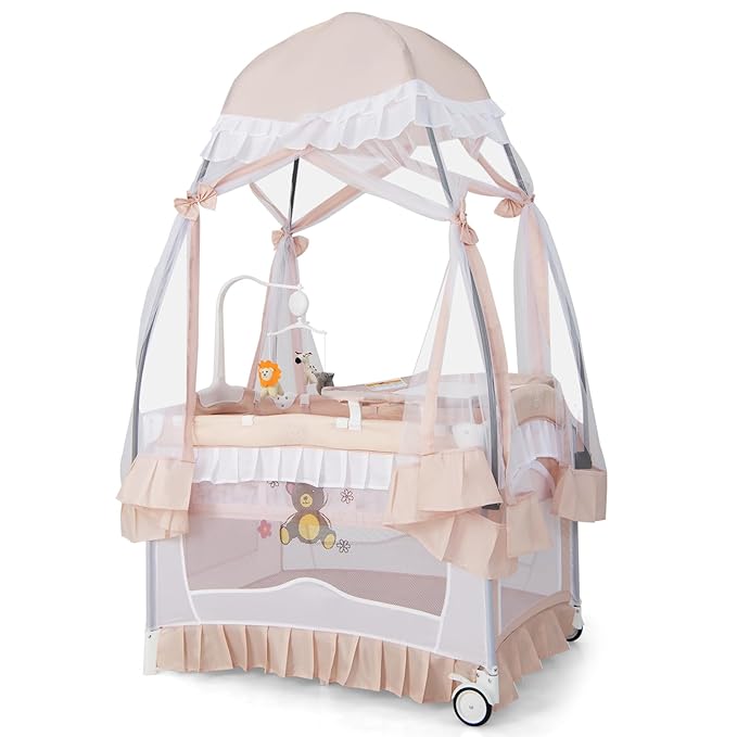 HONEY JOY 4-in-1 Pack and Play with Canopy, Portable Baby Playard w/Changing Table and Infant Bassinet Cute Toys & Music, Foldable Bassinet for Newborn and Toddler(Light Pink)