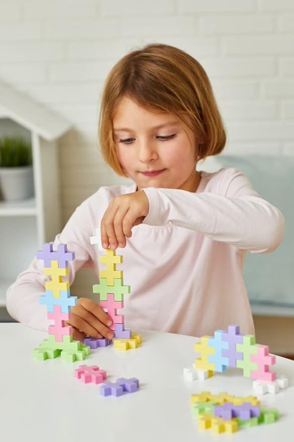 PLUS PLUS Building Set with Metal Suitcase, Open Ended Stem Toy for Toddlers and Preschool, 70 Big Pastel Interlocking Pieces