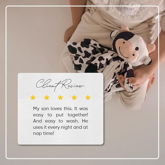 Love By Emi Baby Music Lovey Black & White Cow, Baby Sleep Soother for Crib & Cuddle Bedtime, White Noise with Heartbeat & Lullaby, Plush Sound Toy, Stuffed Animal for Newborns, Infants & Toddlers