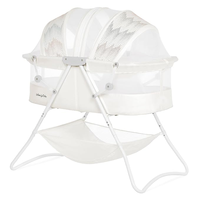 Dream On Me Karley Bassinet in Dove White, Lightweight Portable Baby Bassinet, Quick Fold and Easy to Carry, Adjustable Double Canopy, Indoor and Outdoor Bassinet with Large Storage Basket.