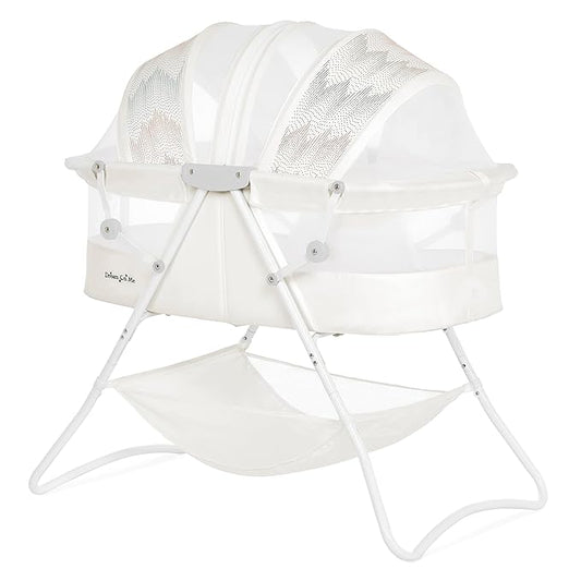 Dream On Me Karley Bassinet in Dove White, Lightweight Portable Baby Bassinet, Quick Fold and Easy to Carry, Adjustable Double Canopy, Indoor and Outdoor Bassinet with Large Storage Basket.