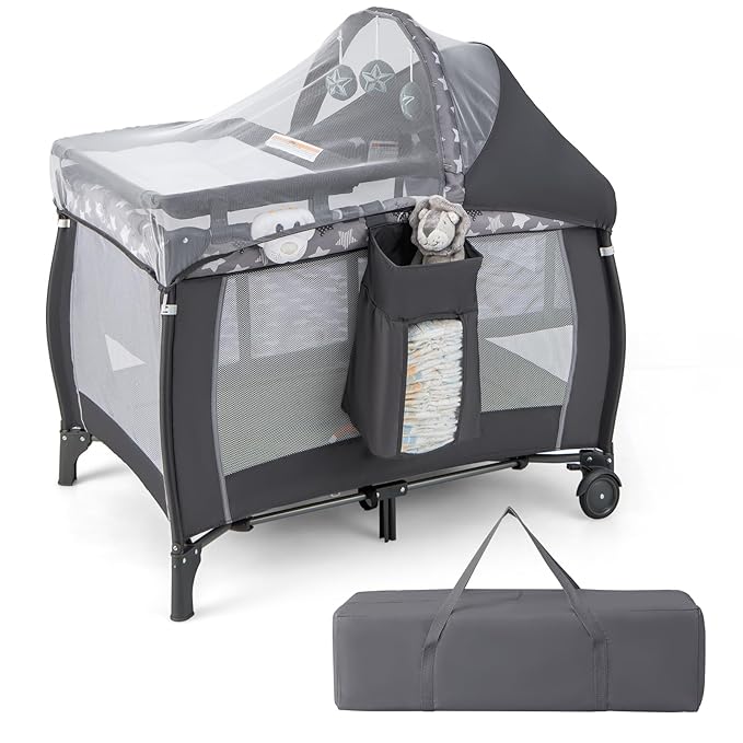 HONEY JOY Pack and Play with Bassinet, 4-in-1 Portable Baby Playard with Changing Table, Net & Cute Toys, Diaper Storage Bag, Music Box, Wheels with Brake, Foldable Newborn Play Yard w/Carry Bag