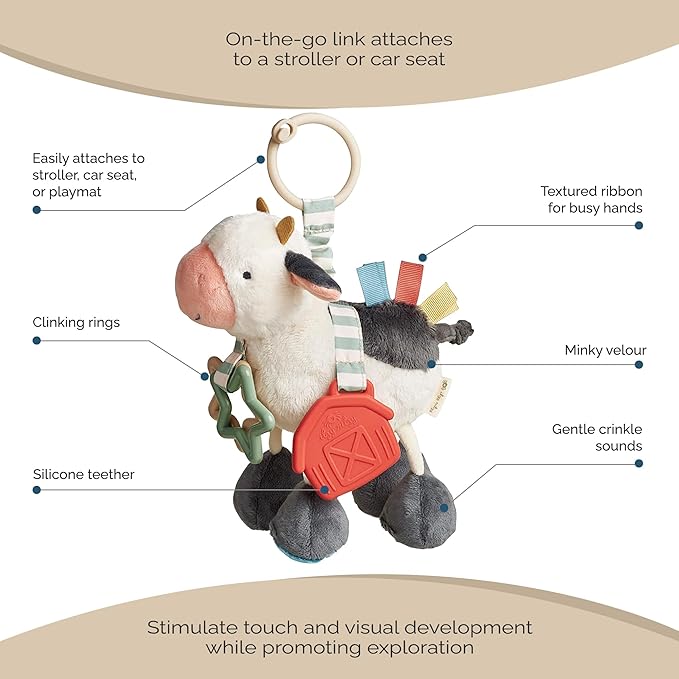 Itzy Ritzy Link & Love Toy for Stroller or Car Seat; Features Textured Ribbons, Crinkle Sounds, Clinking Rings & Silicone Teether; Designed for Ages 0 Months and Up (Cow)