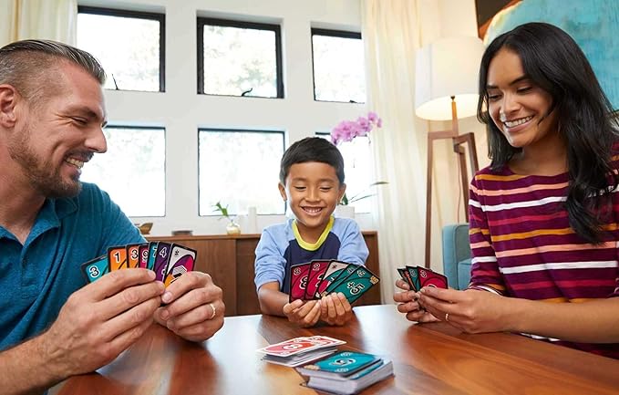 Mattel Games UNO FLIP! Family Card Game, with 112 Cards in a Sturdy Storage Tin, Makes a Great Gift for 7 Year Olds and Up