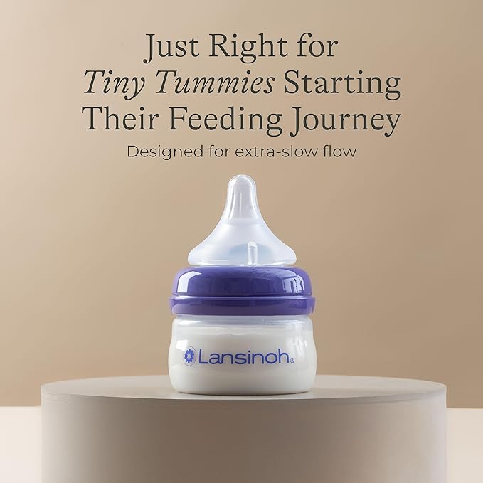 Lansinoh Anti-Colic Baby Bottles for Breastfeeding Babies, 2 Ounces, 2 Count, with 2 Extra Slow Newborn Flow Nipples, Size XS