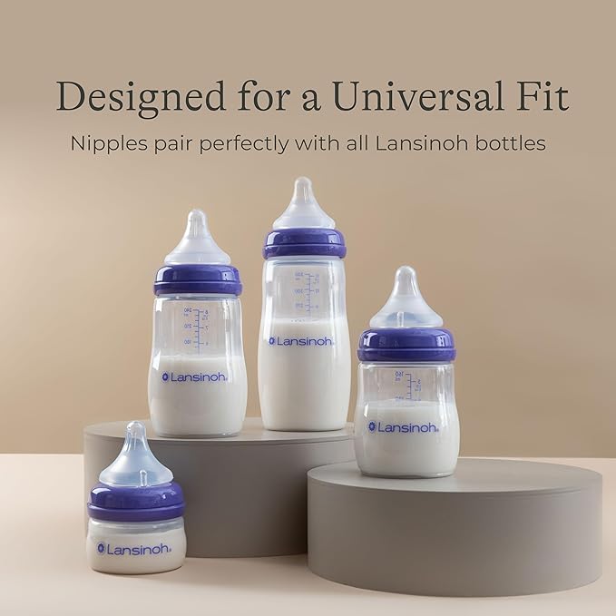 Lansinoh Anti-Colic Baby Bottles for Breastfeeding Babies, 2 Ounces, 2 Count, with 2 Extra Slow Newborn Flow Nipples, Size XS