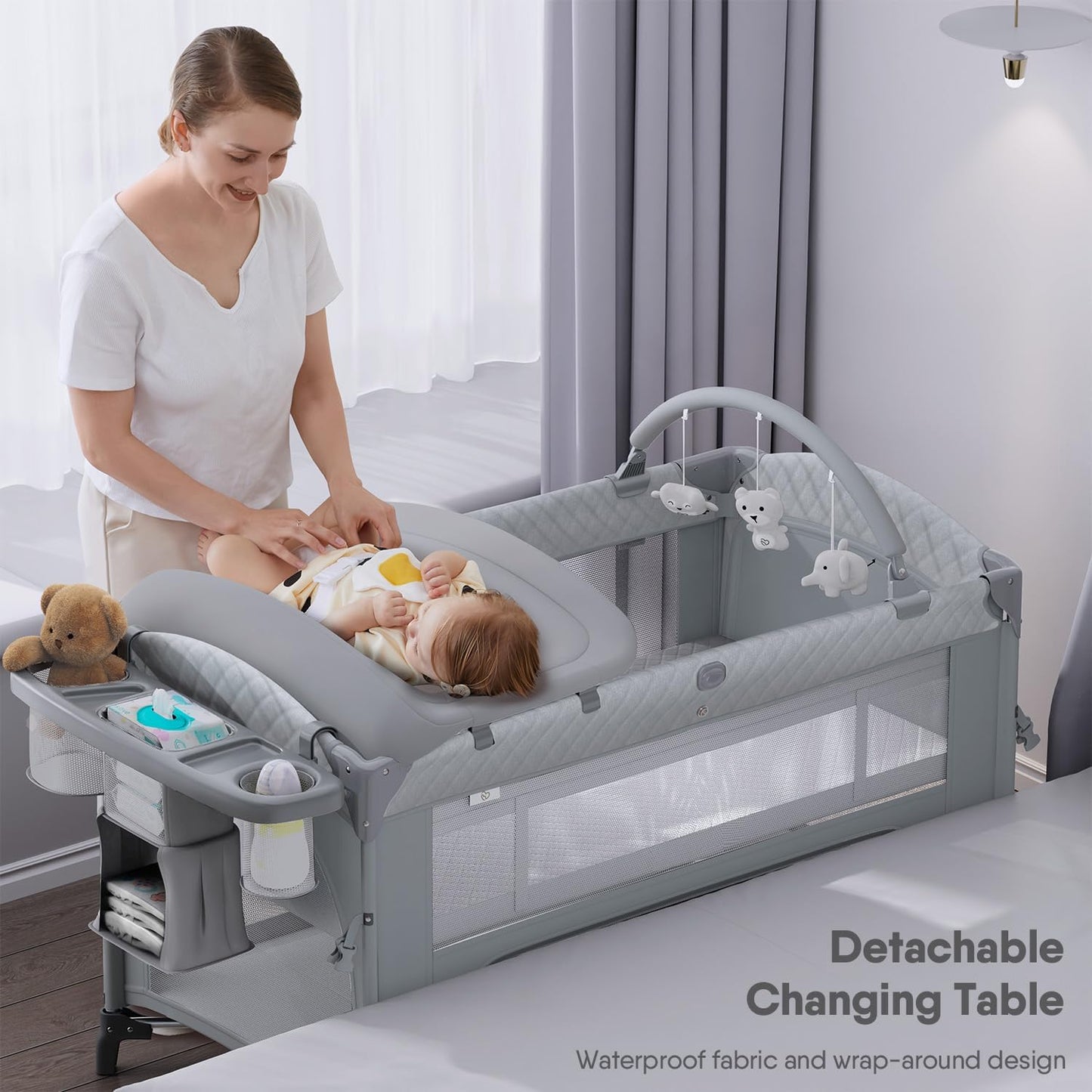 4 in 1 Baby Bassinet, Pack and Play, Bedside Crib Sleeper, Diaper Changer - Comes with Mattress, Mosquito Net，Bottom Storage and Toy Bar for Newborn to Toddles