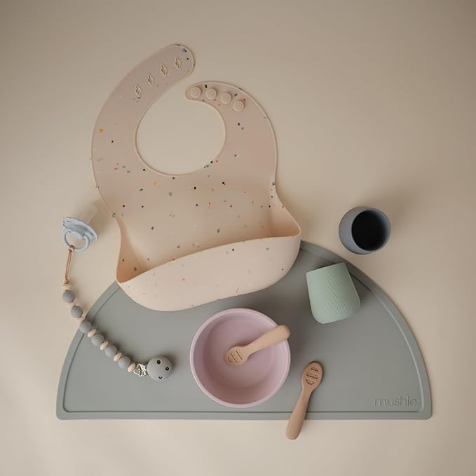 mushie Silicone Baby Bib | Adjustable Fit Waterproof Bibs (Vanilla Confetti)