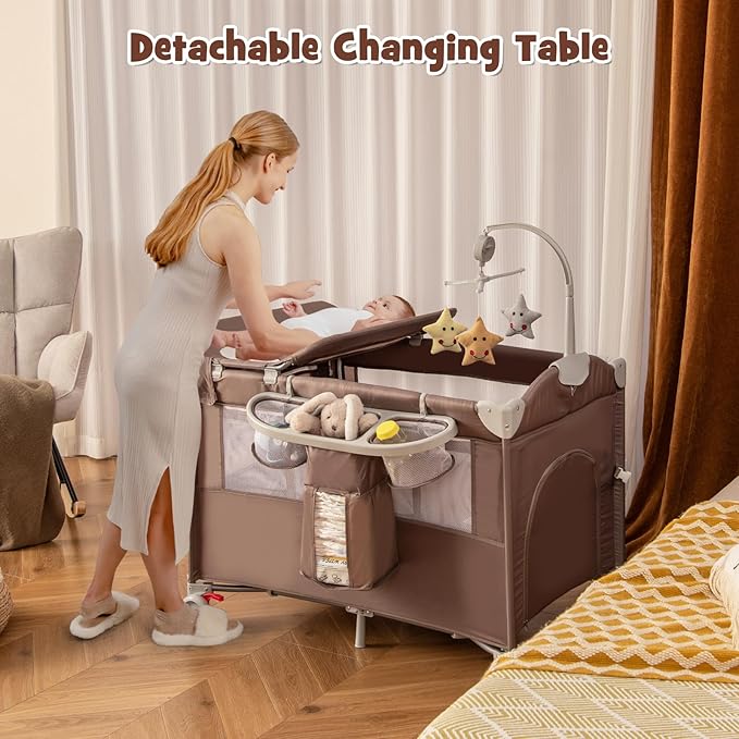 HONEY JOY Pack and Play with Bassinet, 5-in-1 Baby Bedside Sleeper w/Diaper Changing Table & Storage Bag, Toy Arch & Music Box, Detachable Side Rail, Portable Baby Play Yard w/Carry Bag(Coffee)