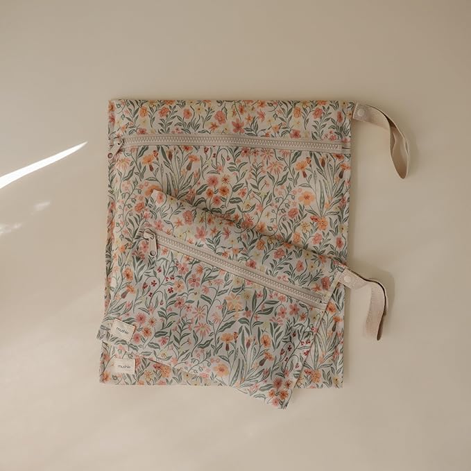 mushie Water Resistant Wet Bags | Large & Small Reusable Storage Bag for Baby Items and Travel | Zippered Pockets with Handle | Machine Washable, Set of 2 (Pastel Blooms)
