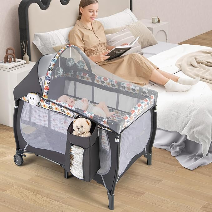 HONEY JOY Pack and Play, 4 in 1 Portable Baby Playard w/Bassinet, Changing Table, Lockable Wheel, Music, Foldable Travel Baby Crib Nursery Center from Newborn to Toddler(Gray, Elephant)