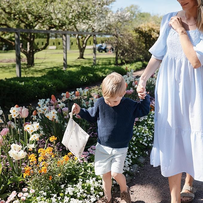 mushie Water Resistant Wet Bags | Large & Small Reusable Storage Bag for Baby Items and Travel | Zippered Pockets with Handle | Machine Washable, Set of 2 (Retro Flowers)