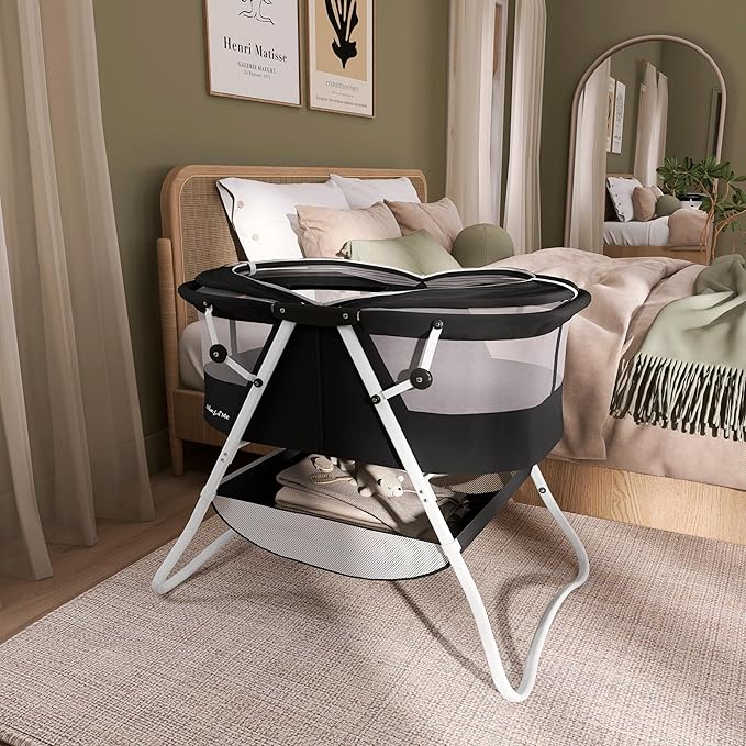 Dream On Me Karley Bassinet in Black, Lightweight Portable Baby Bassinet, Quick Fold and Easy to Carry, Adjustable Double Canopy, Indoor and Outdoor Bassinet with Large Storage Basket.